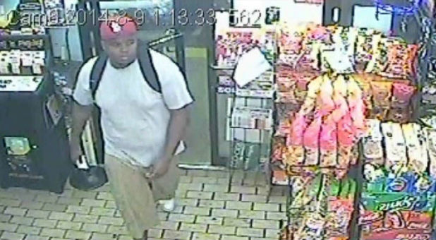 Michael Brown is seen entering the Ferguson Market hours before the unarmed 18-year-old was shot dead by a police officer.