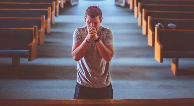 2017 spirit man kneeling praying repenting