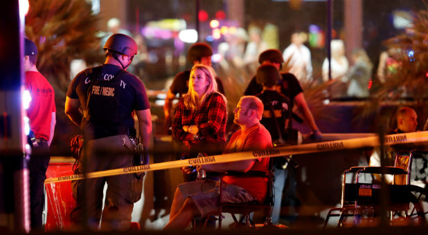 People wait in a medical staging area on October 2, 2017, after a mass shooting during a music festival in Las Vegas, Nevada.