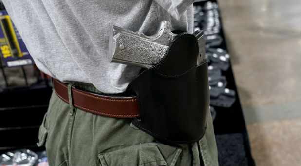 A concealed carry holster is displayed for sale at the Guntoberfest gun show.