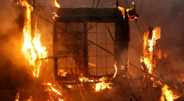 A burning structure is seen at the Hilton Sonoma Wine Country during the Tubbs Fire in Santa Rosa.