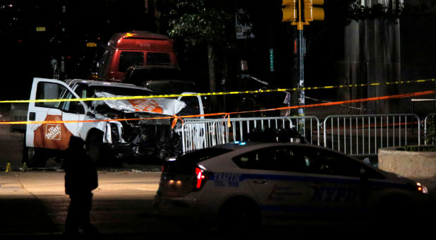 The pickup truck used in an attack on the West Side Highway sits behind police tape in Manhattan.