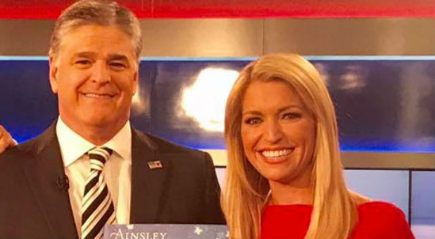 Ainsley Earhardt, right, with Sean Hannity.