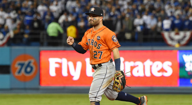 Houston Astros second baseman Jose Altuve celebrates after defeating the Los Angeles Dodgers in Game 7 of the 2017 World Series.