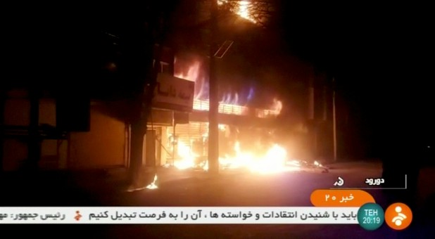 A building on fire is seen in Dorud, Iran, in this still image taken from video on December 31, 2017.