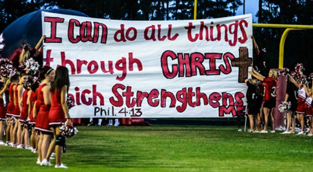 For the past six years, a Texas school district has been waging legal warfare against a group of high school cheerleaders who wrote Bible verses on football run-through banners.