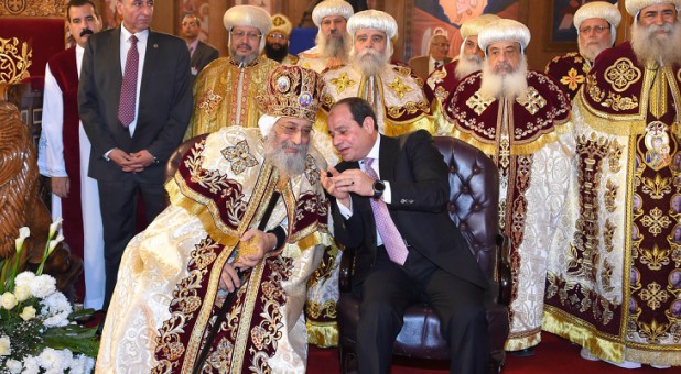 Egyptian Coptic Pope Tawadros II (L), Pope of the Coptic Orthodox Church of Alexandria and Patriarch of Saint Marc Episcopate receives Egyptian President Abdel Fattah al-Sisi (R), at the new Coptic Cathedral.