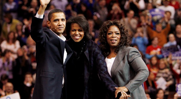 Oprah, far right, with the Obamas in 2007.