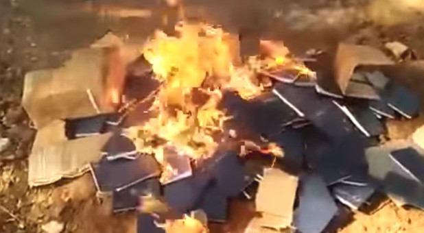 Hindu nationalists burn Bibles.
