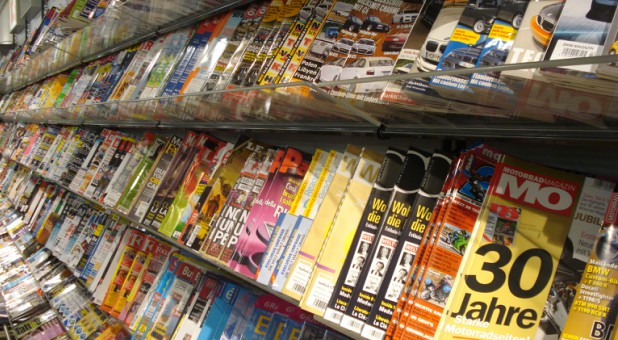 The super retailer is banning the Jezebelic magazine with lewd headlines and suggestive images from its checkout lines.