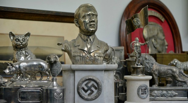 A bust of dictator Adolf Hitler, among other Nazi artifacts seized in the house of an art collector, is on display in Buenos Aires.