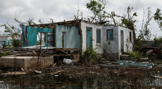 Homes sit in ruins at Codrington on the island of Barbuda just after a month after Hurricane Irma struck the Caribbean.