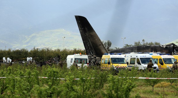An Algerian military plane is seen after crashing near an airport outside the capital Algiers, Algeria, April 11, 2018.
