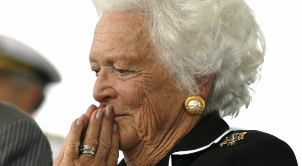 ormer first lady Barbara Bush listens to remarks during the christening ceremony of the USS George H.W. Bush at Northrop-Grumman's shipyard in Newport News, Virginia, U.S., October 7, 2006.