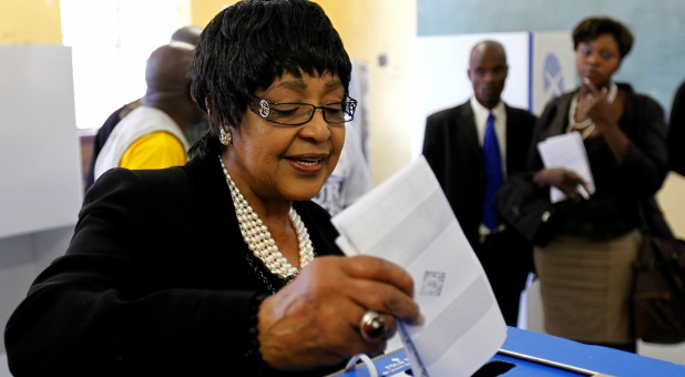 Winnie Madikizela Mandela, former wife of Nelson Mandela, casts her vote during the South African municipal elections.