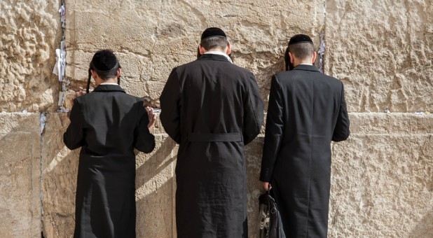 Men pray at the Western Wall in Israel.