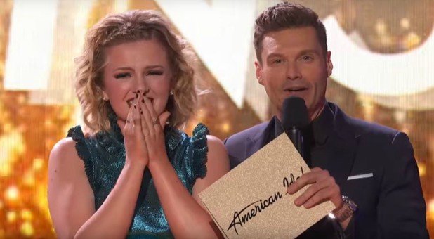 Maddie Poppe, left, with host Ryan Seacrest.