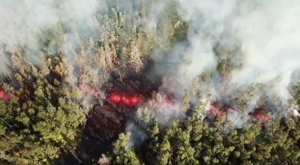 Lava emerges from the ground after Kilauea Volcano erupted, on Hawaii's Big Island.