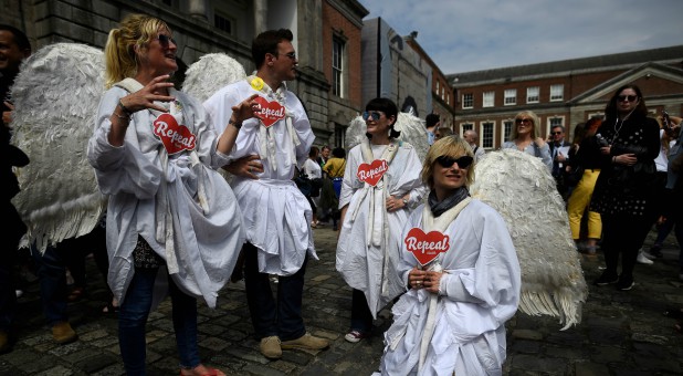 People celebrate Ireland repealing abortion restrictions.