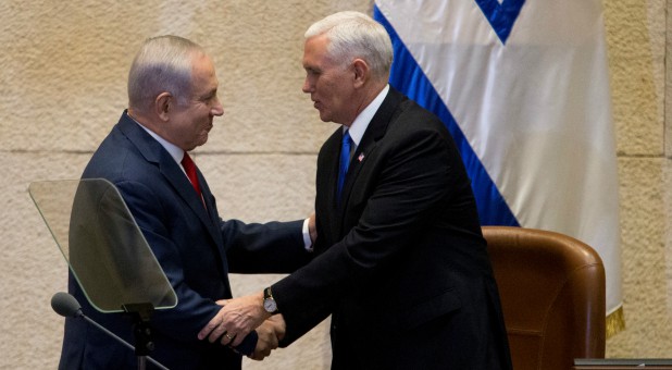 U.S. Vice President Mike Pence shakes hands with Israeli Prime Minister Benjamin Netanyahu.