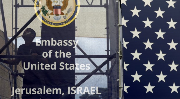 A worker is seen inside the new U.S. embassy compound during preparations for its opening ceremony, in Jerusalem.
