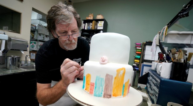 Jack Phillips, decorates a cake in his Masterpiece Cakeshop.
