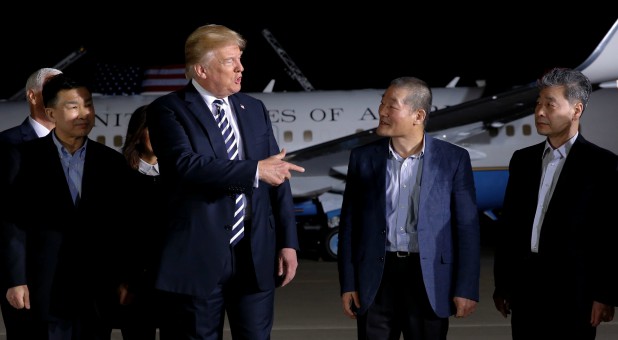 U.S.President Donald Trump greets the Americans released from detention in North Korea, Tony Kim, Kim Hak-song and Kim Dong-chul, upon their arrival at Joint Base Andrews, Maryland.