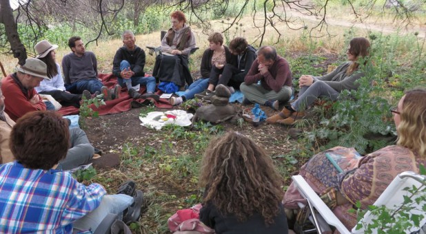A dozen people gather in a quiet spot in the Ventura River Preserve about 70 miles north of Los Angeles for a Sunday meeting of the Ojai Church of the Wild.