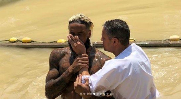 Odell Beckham Jr. is baptized in the Jordan River.