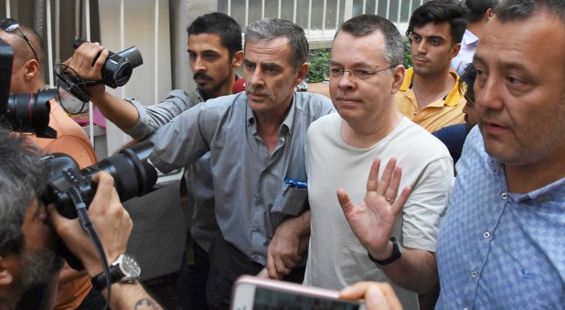 U.S. pastor Andrew Brunson reacts as he arrives at his home after being released from the prison in Izmir, Turkey.
