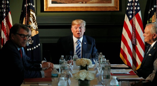 U.S. President Donald Trump participates in a roundtable discussion.