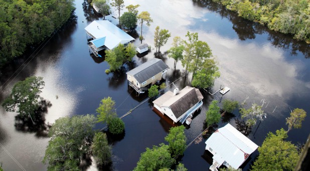 An aerial view of flooded homes is shown during a local aerial orientation and reconnaissance flight by the Pennsylvania National Guard, ahead of search and rescue operations in the area of Nichols, South Carolina