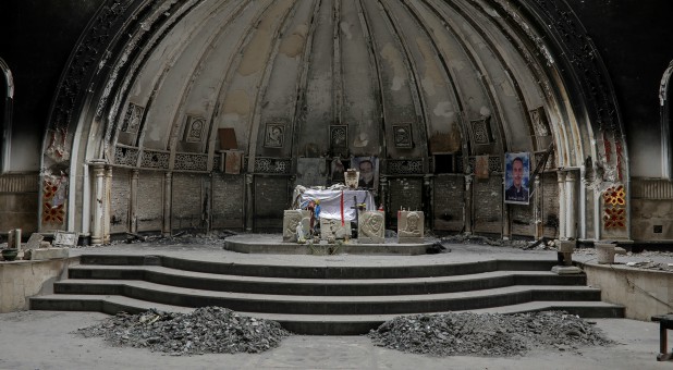 An altar of a damaged church is seen in the town of Qaraqosh, south of Mosul, Iraq.