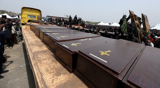 A truck carries the coffins of people killed by the Fulani herdsmen.