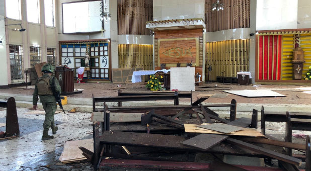 Bombings devastate Catholic church in Southern Philippines.