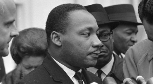 Martin Luther King Jr. speaks after meeting with President Lyndon B. Johnson to discuss civil rights at the White House in Washington, U.S., Dec. 3, 1963.