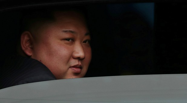 North Korea's leader Kim Jong Un sits in his vehicle after arriving at the Dong Dang railway station, Vietnam.