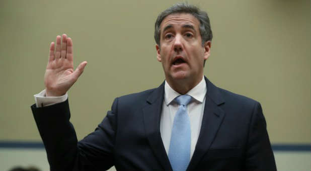 Michael Cohen, the former personal attorney of U.S. President Donald Trump, is sworn in to testify before a House Committee on Oversight and Reform hearing on Capitol Hill in Washington, U.S., Feb. 27, 2019.