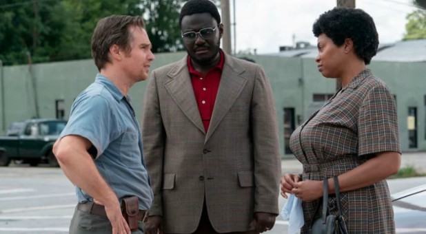 Sam Rockwell, left, and Taraji P. Henson, right, star in “The Best of Enemies.”