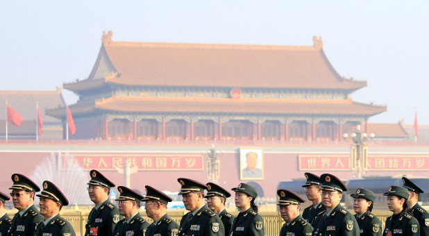 Military delegates arrive at the Great Hall of the People for a meeting ahead of National People's Congress (NPC), China's annual session of parliament, in Beijing, China.