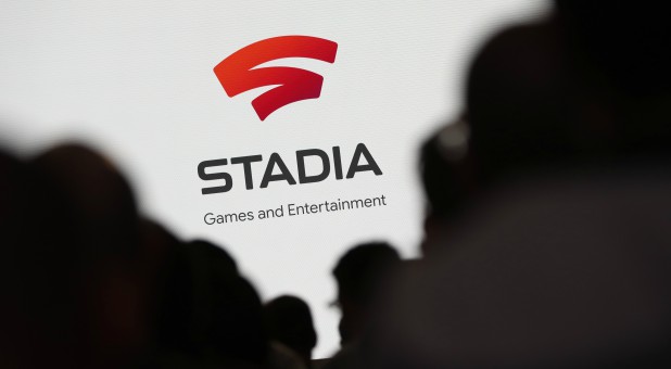 Spectators look on during a Google keynote address announcing a new video gaming streaming service named Stadia.