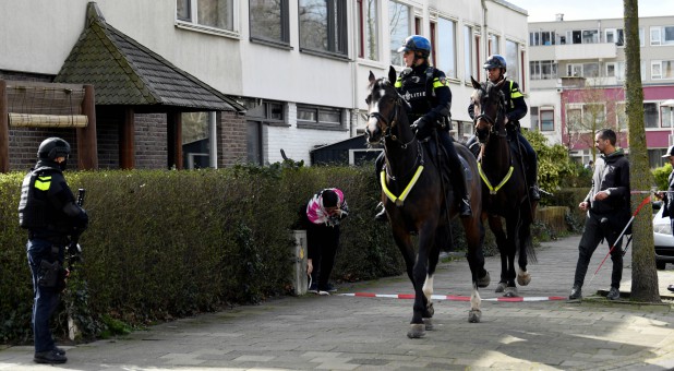 Mounted police are seen after a shooting in Utrecht, Netherlands.