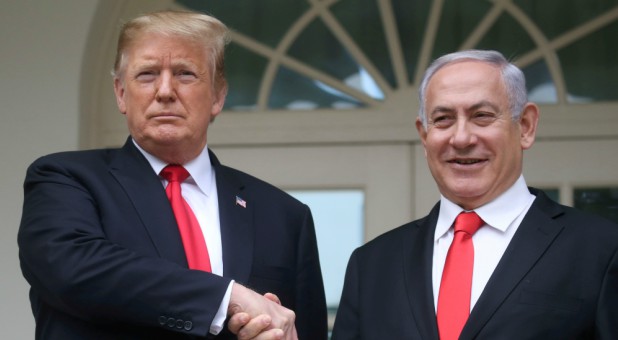 U.S. President Donald Trump shakes hands with Israel's Prime Minister Benjamin Netanyahu