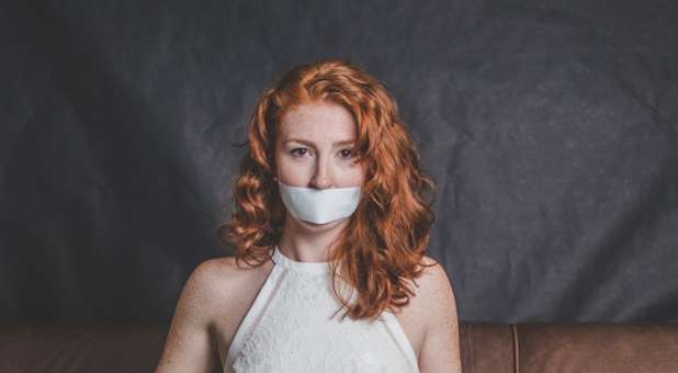 2019 04 woman taped mouth