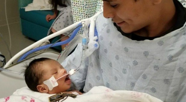 Yovani Lopez with baby Yadiel