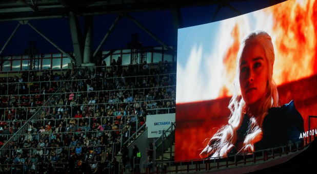 The character Daenerys Targaryen is seen on an advertisement screen before the screening of the final episode of