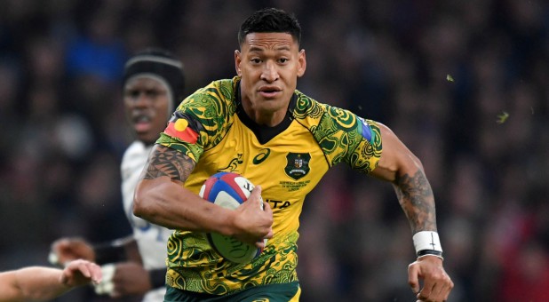 Australia's Israel Folau runs in to score their first try.