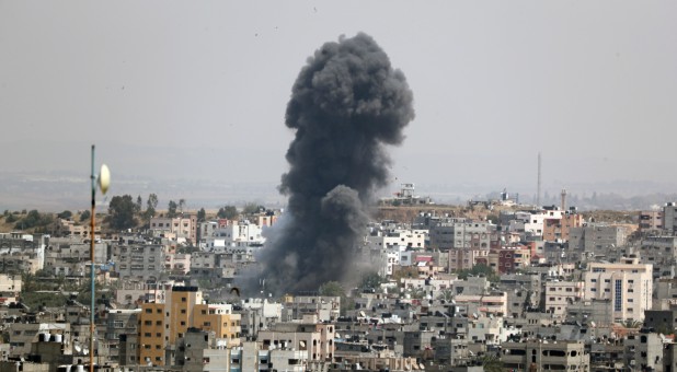 Smoke rises following an Israeli air strike in Gaza.