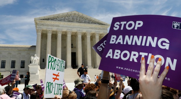 Abortion rights activists rally outside the U.S. Supreme Court.