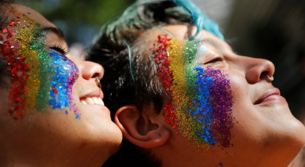 Revelers participate in the Gay Pride parade along Paulista Avenue in Sao Paulo, Brazil.